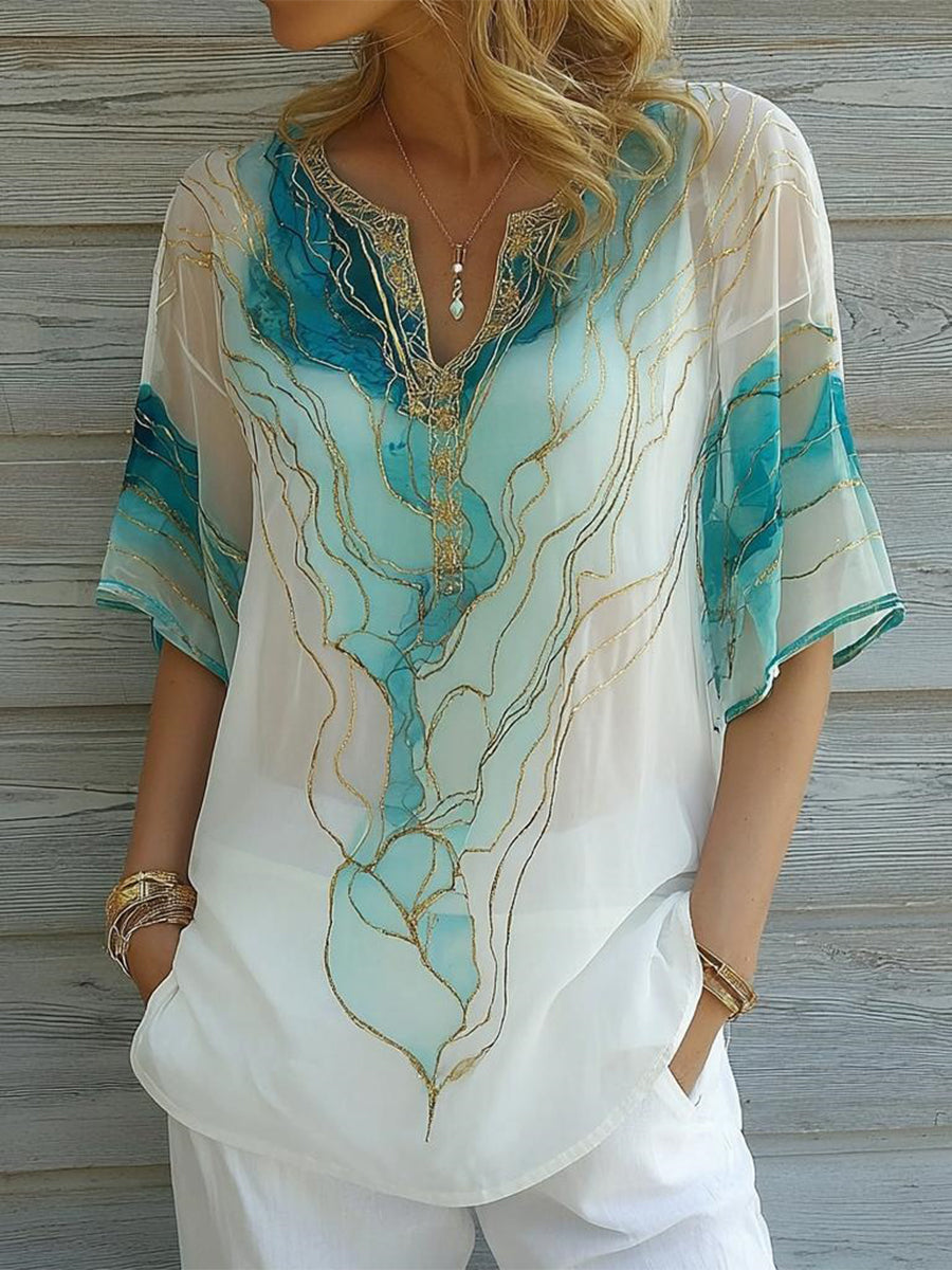 Magnifique haut bleu à col en V