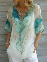 Magnifique haut bleu à col en V