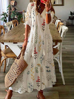 Robe maxi de vacances à fleurs et franges amples