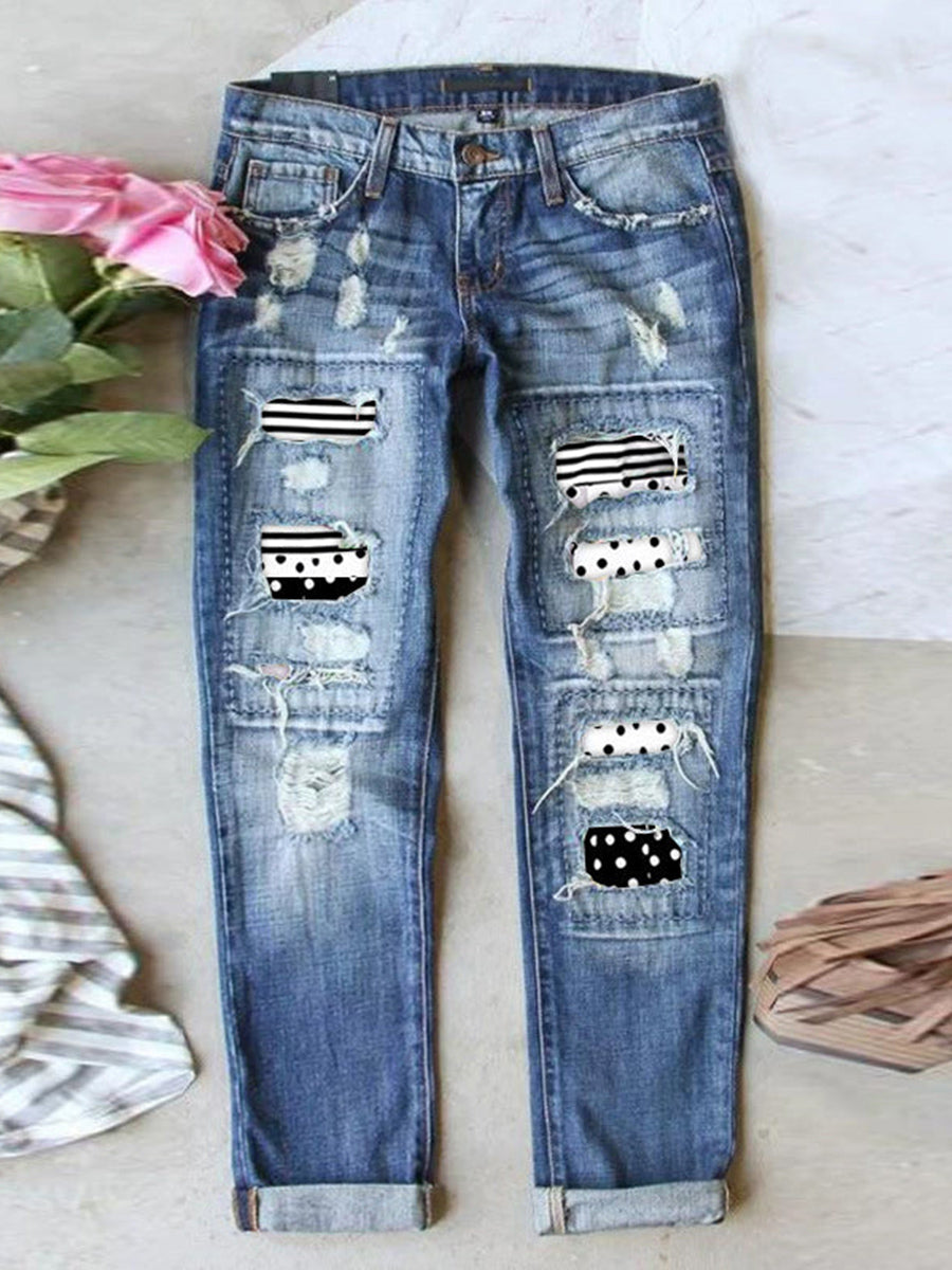 Jean stretch déchiré à ourlet brut effiloché et usé