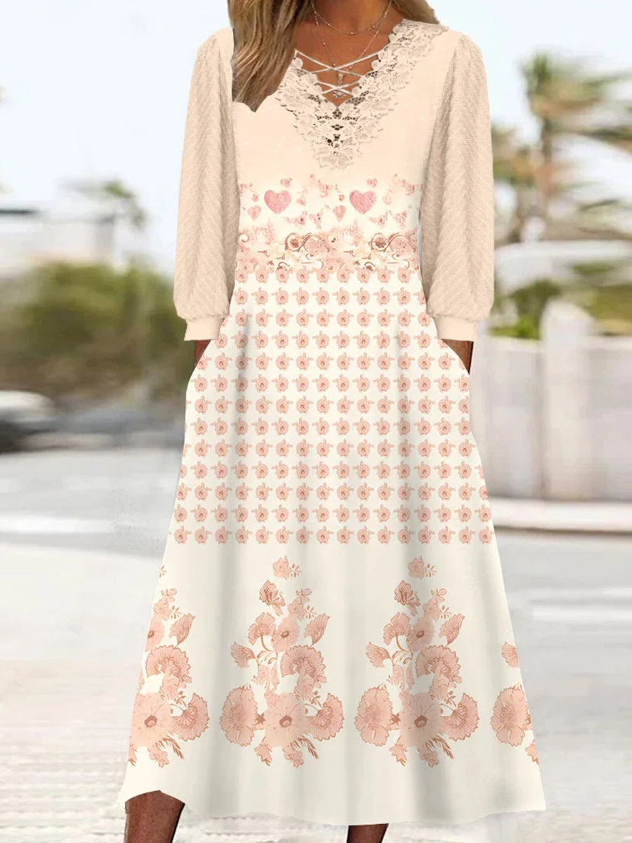 Robe midi à manches longues et col en V pour femme, ornée de dentelle et d'un imprimé graphique.