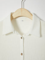 Chemisier à manches longues, col à nœud papillon, couleur unie, avec boutons