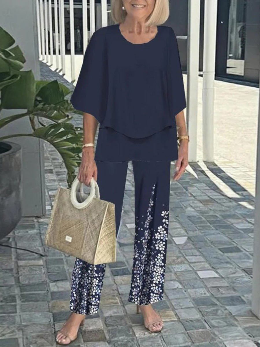 Ensemble deux pièces bleu marine à manches 3/4 et col rond