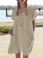 Robe ample unie à poches et revers pour femme