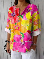 Haut romantique à manches longues et col en V imprimé floral