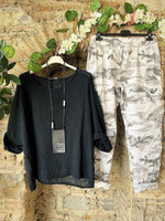 Schwarzes, lässiges zweiteiliges Set mit Rundhalsausschnitt und langen Ärmeln