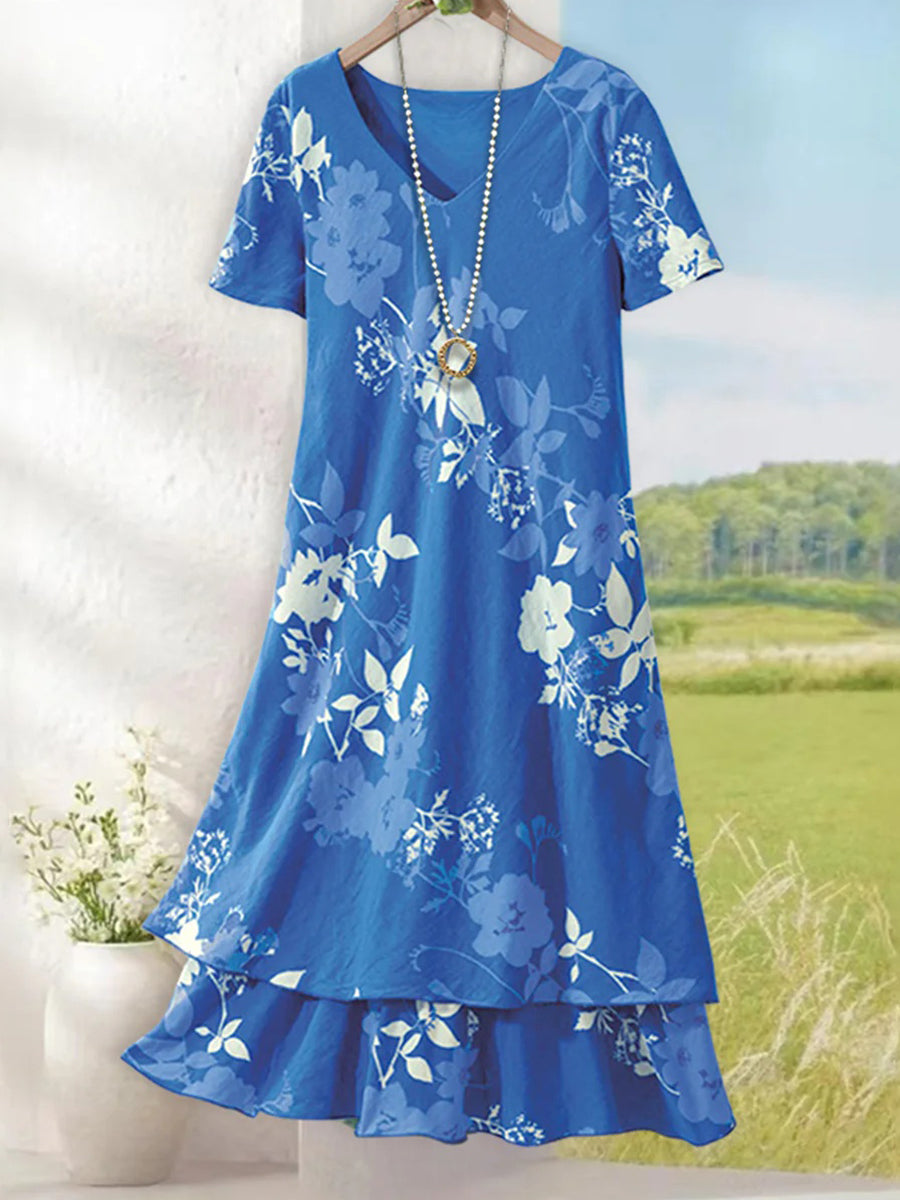 Blaues Minikleid mit Blumenmuster, V-Ausschnitt und kurzen Ärmeln