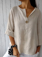 Haut uni à manches courtes, col en V et boutons