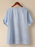 Blouse à imprimé floral patchwork et boutons, col rond