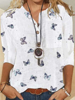 Chemisier blanc à col en V et manches 3/4 imprimé papillon