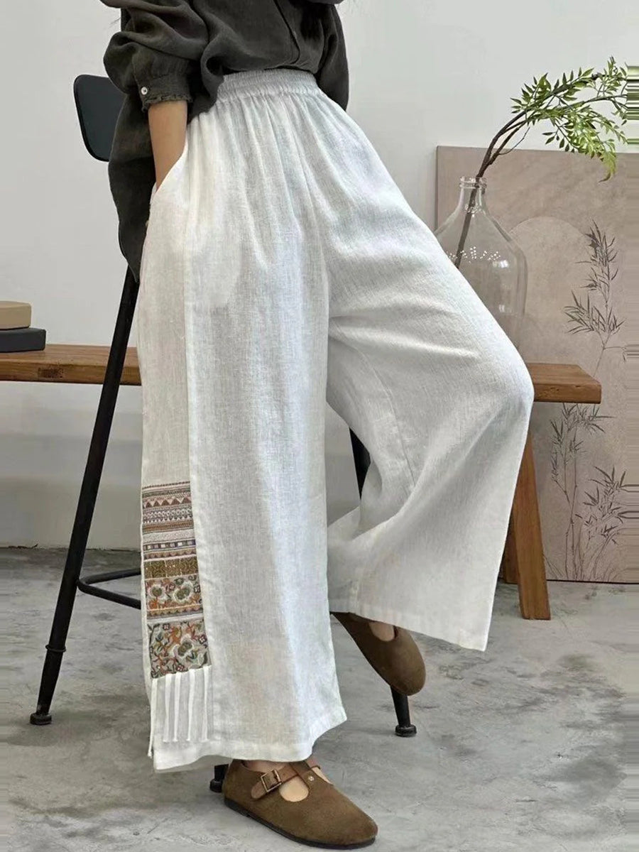 Pantalon blanc uni à poches latérales et taille élastique