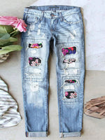 Jean stretch déchiré à ourlet brut effiloché et usé