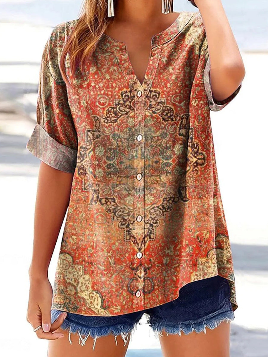 Haut rétro rouge à col en V et manches courtes