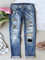 Jean stretch déchiré à ourlet brut effiloché et usé