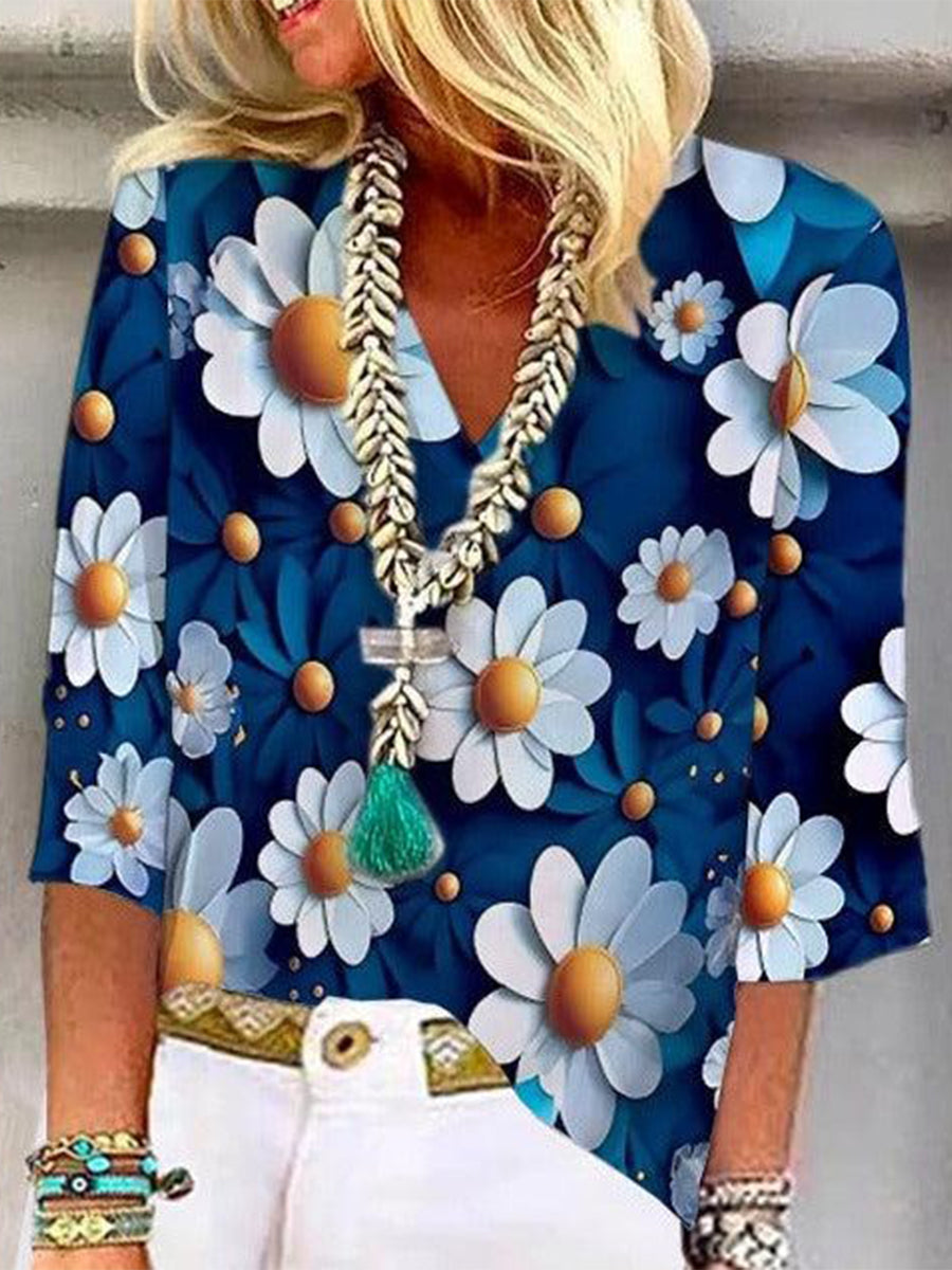 Schickes blaues Top mit Blumenmuster und 3/4-Ärmeln