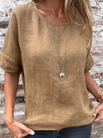 Chemisier uni à col rond et manches courtes