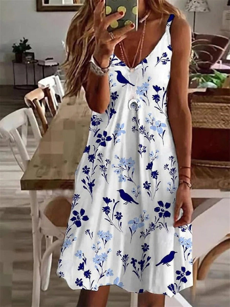 Robe blanche décontractée à col en V et imprimé floral sans manches