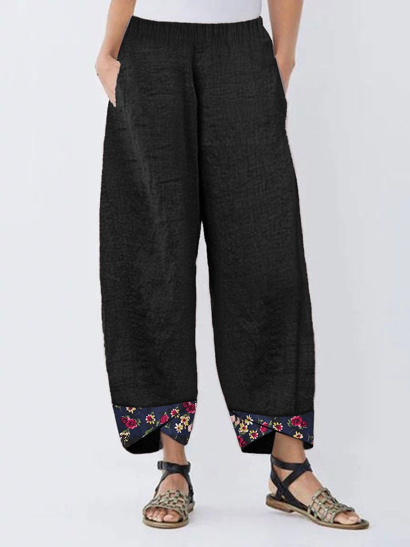 Pantalon patchwork à imprimé floral irrégulier
