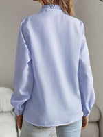 Blaue Langarmbluse mit Print