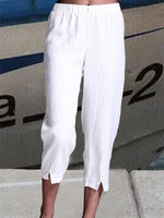 Pantalon capri uni en lin, coupe ample et taille élastique, idéal pour l'été.
