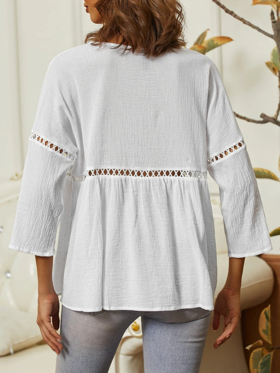 Chemisier blanc confortable à col rond et manches 3/4