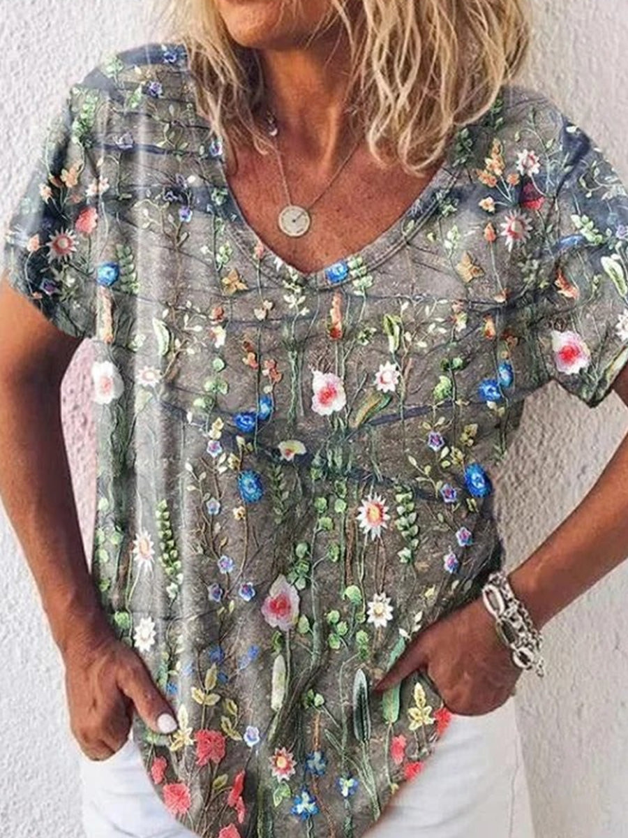 Lässiges graues T-Shirt mit Blumenmuster und lockerem V-Ausschnitt