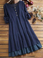 Robe bleue unie à col rond et manches 3/4
