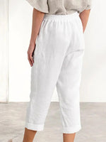 Pantalon court blanc à poches boutonnées