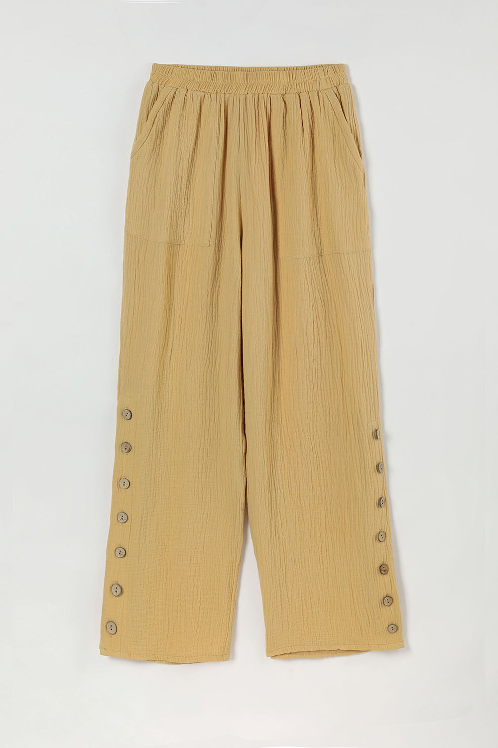 Lässige Sommerhose aus einfarbigem Stoff mit Knöpfen und Taschen