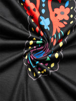 Robe midi bohème noire à fleurs et col en V