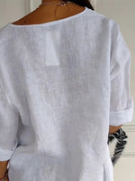 Haut uni à manches courtes, col en V et boutons