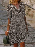 Lässiges Minikleid mit Blumenmuster, V-Ausschnitt, halben Ärmeln und H-Linie