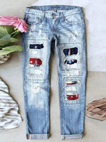 Jean stretch déchiré à ourlet brut effiloché et usé