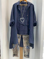 Ensemble trois pièces bleu grande taille : débardeur, pantalon et cardigan.