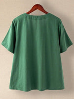 Kurzarmbluse mit Katzenprint und Knöpfen