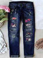 Jean stretch déchiré à ourlet brut effiloché et usé