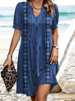 Robe mini élégante bleue à imprimé graphique et manches courtes