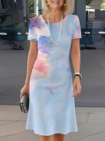 Superbe mini-robe bleue à col rond et manches courtes