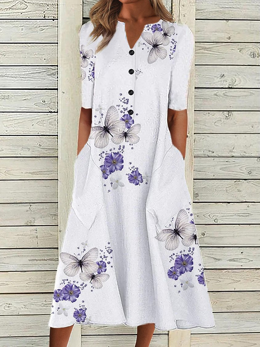Robe blanche décontractée à col en V, imprimé floral et manches courtes