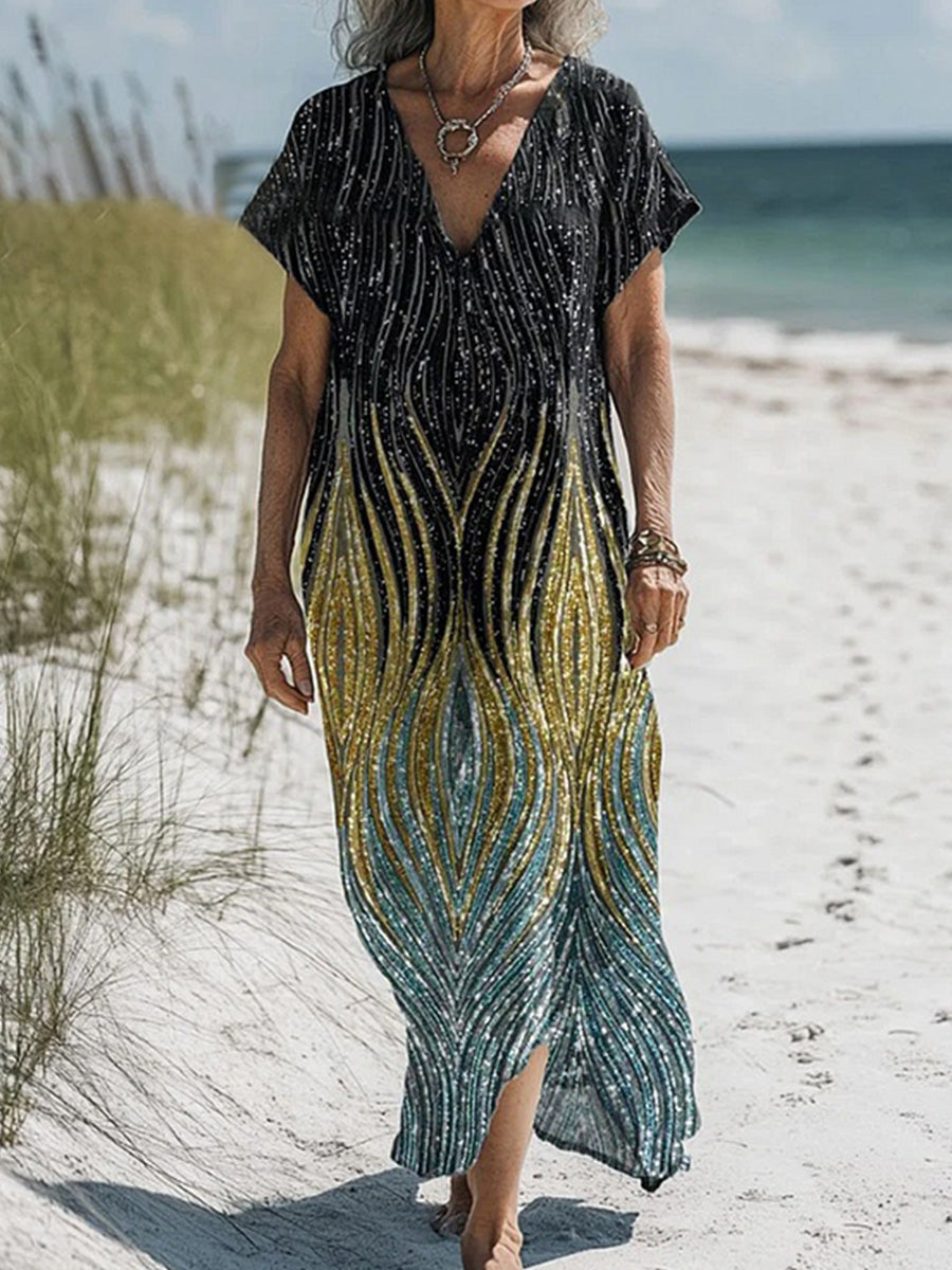 Kurzarmkleid aus Baumwolle mit silber-goldenem Farbverlauf und Kunstdruck.