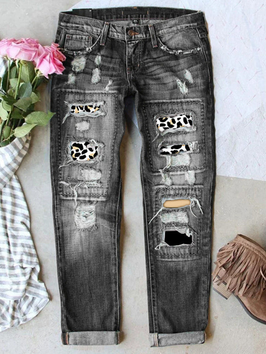 Jean stretch déchiré à ourlet brut effiloché et usé