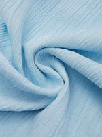 Blaue Freizeithose mit Strukturmuster und Schnallentaschen