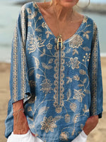 Blaues Top mit V-Ausschnitt und 3/4-Ärmeln