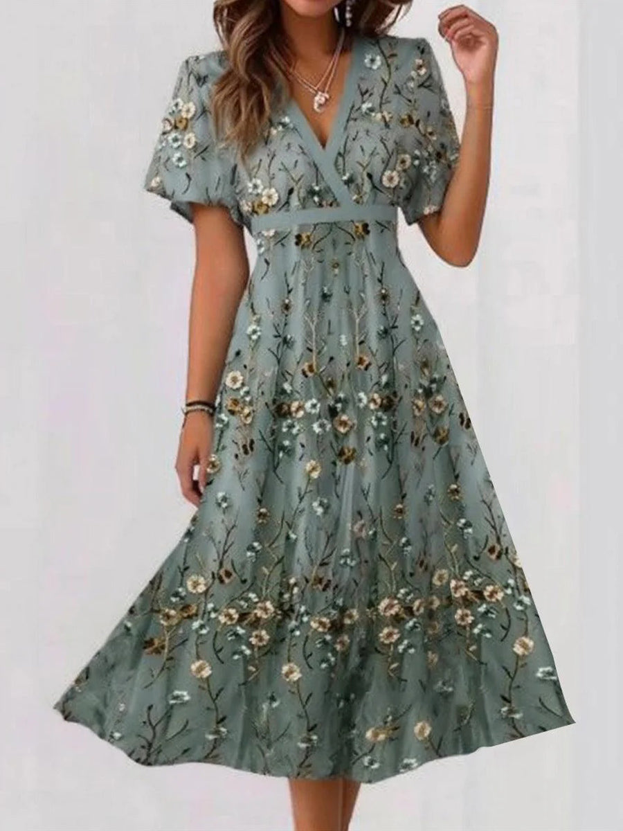 Robe midi élégante à imprimé floral, col en V et manches courtes