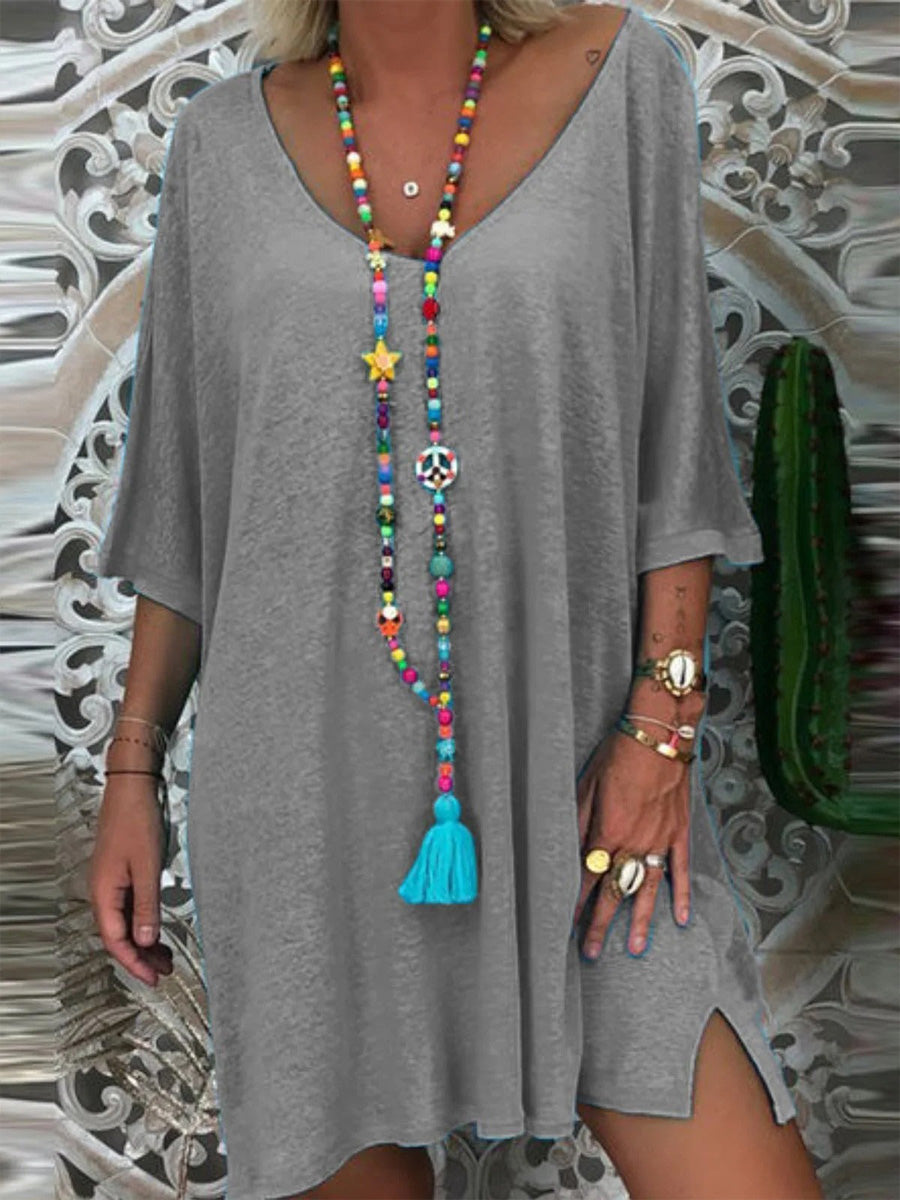 Robe courte unie ample à manches mi-longues