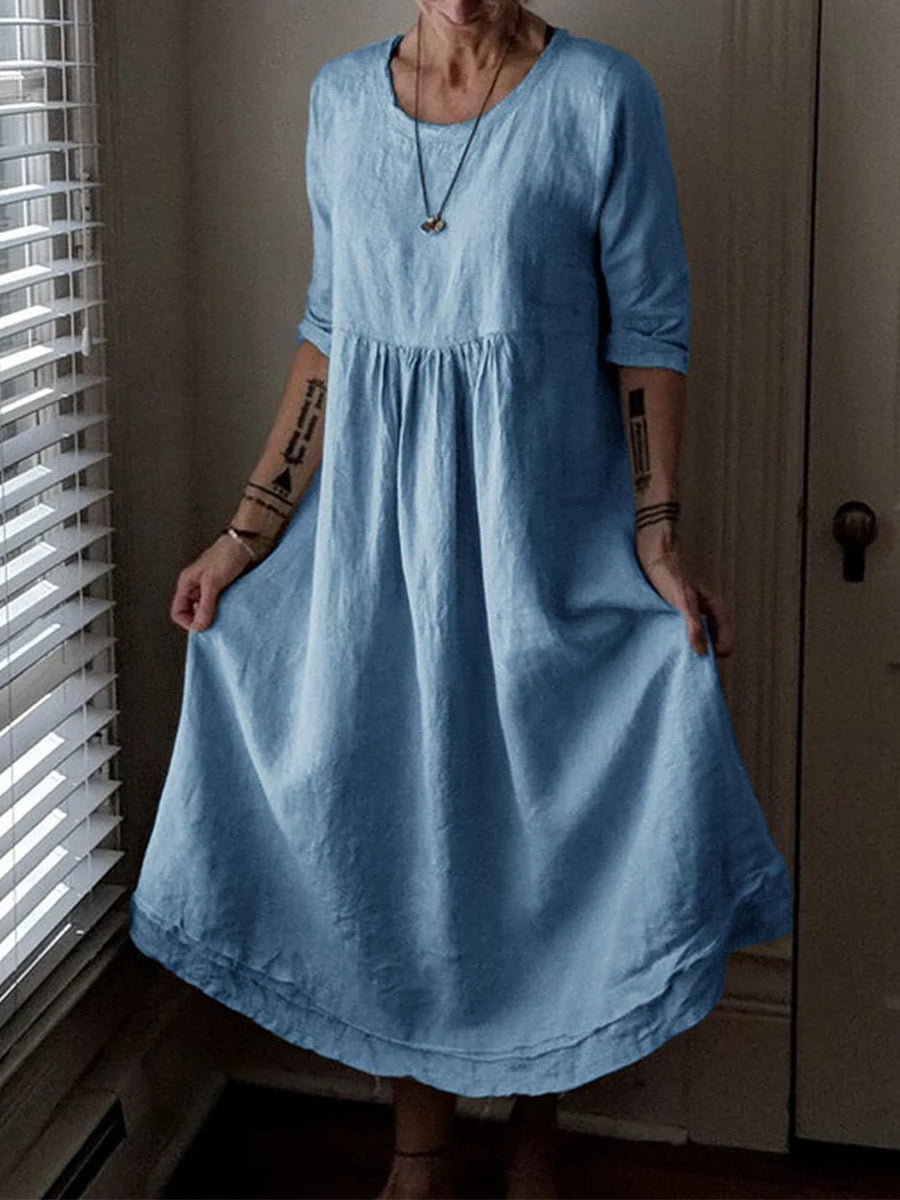 Robe élégante ample à col rond et couleur unie