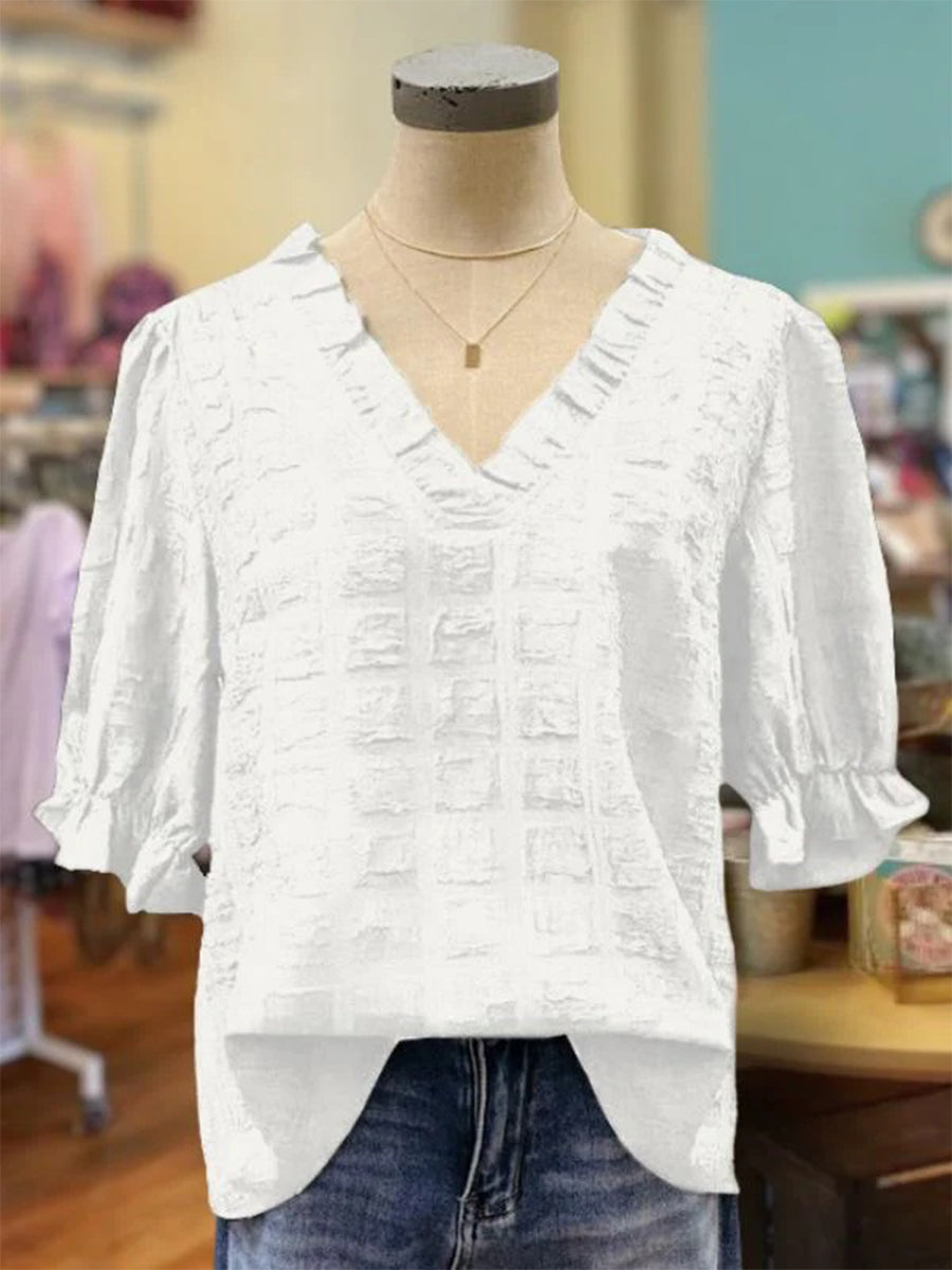 Haut texturé à manches bouffantes