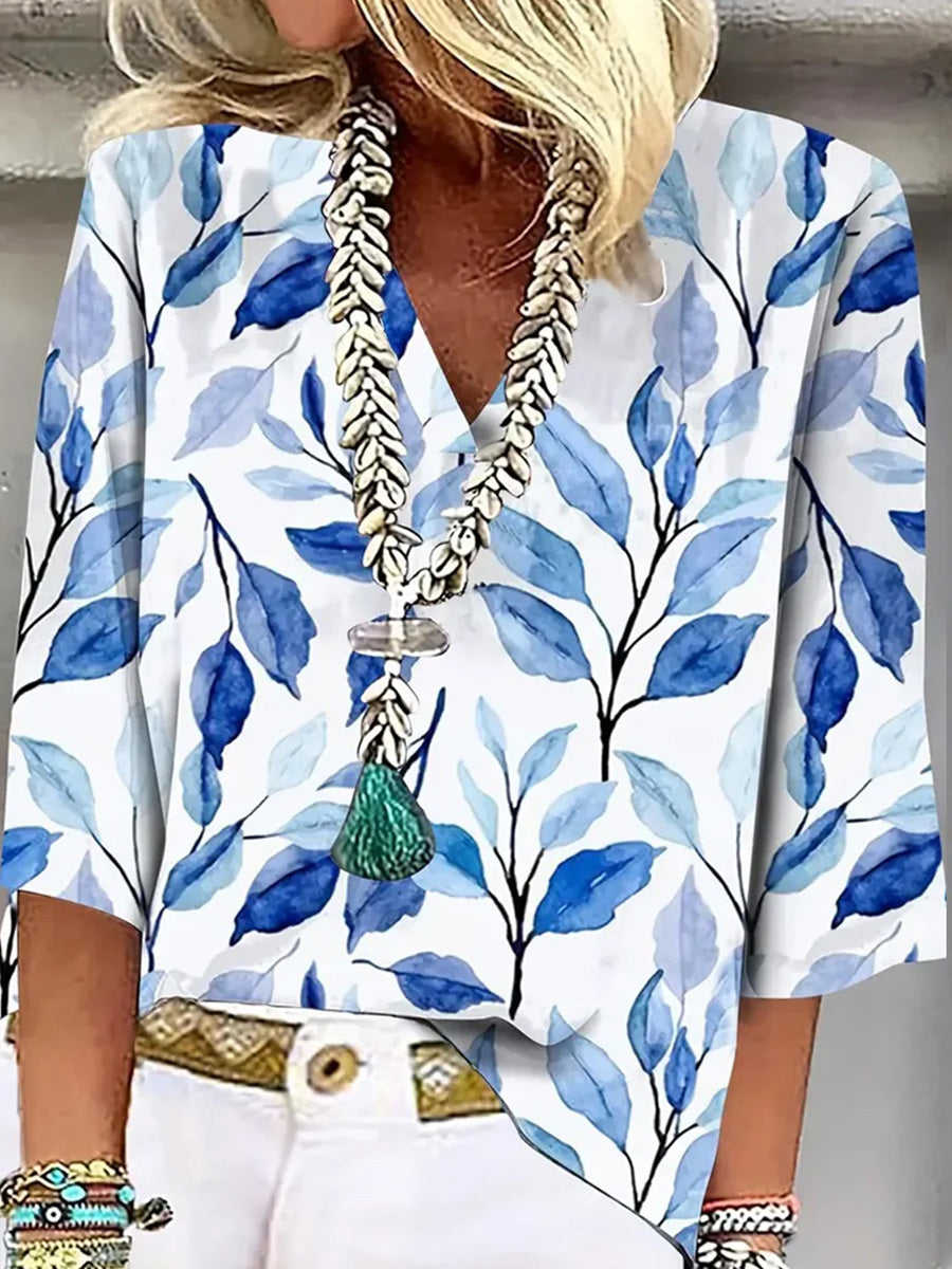 Blaues Top mit V-Ausschnitt und 3/4-Ärmeln