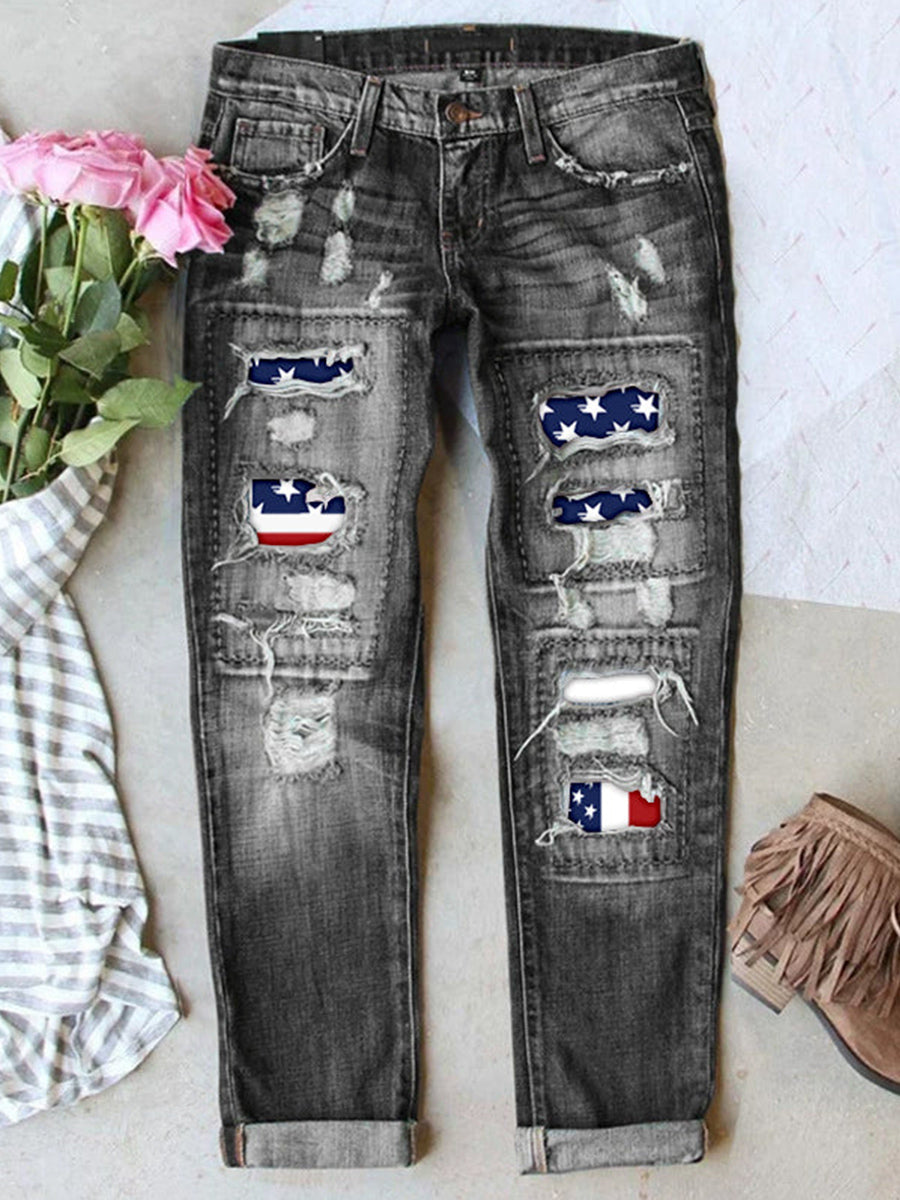 Jean stretch déchiré à ourlet brut effiloché et usé