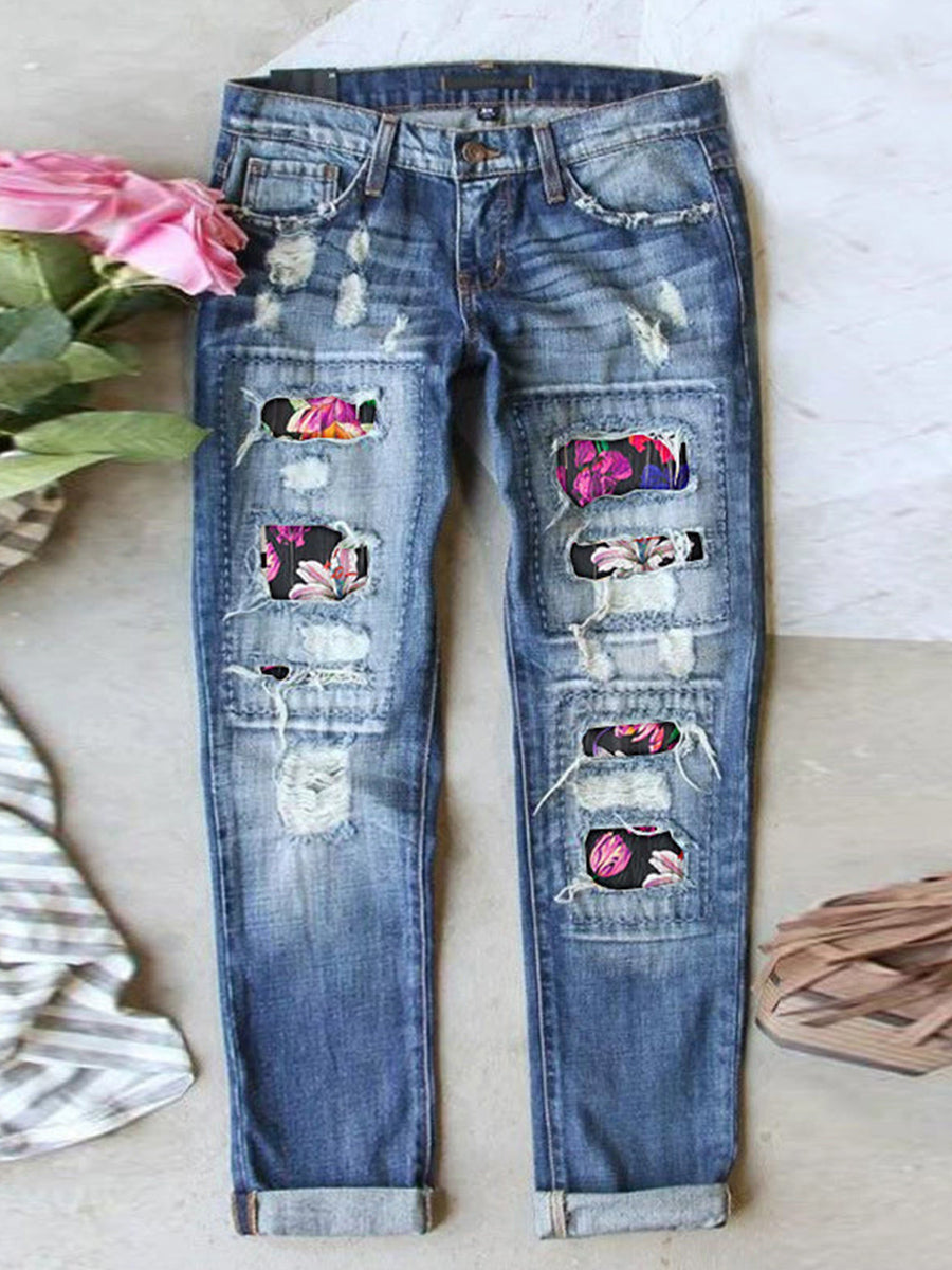 Jean stretch déchiré à ourlet brut effiloché et usé